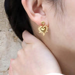 Boucles d'oreilles Ex Voto en acier inoxydable doré - Boutique We Are ParisLes Cléias Acier Inoxydable