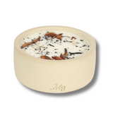 Bougie fleurie et pot en grès, parfum Thé & Pain d'Épices