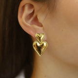 Boucles d'oreilles Amour, en inoxydable doré - Boutique We Are ParisLes Cléias Acier Inoxydable