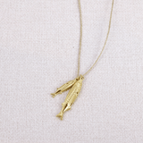 Chaîne en lurex gri - gri pendentif poissons en acier inoxydable doré - Boutique We Are ParisLes Cléias Acier Inoxydable
