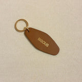 Porte - clé BISOUS – Cuir recyclé & acier doré - Boutique We Are ParisLes Cléias Acier Inoxydable