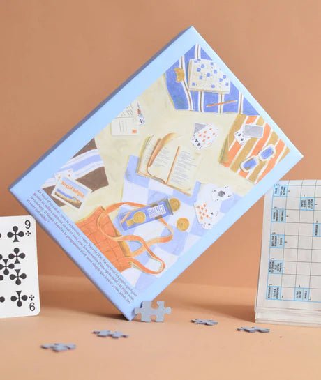 Puzzle 500 pièces "Du sable entre les pages" - Boutique We Are ParisJour Férié